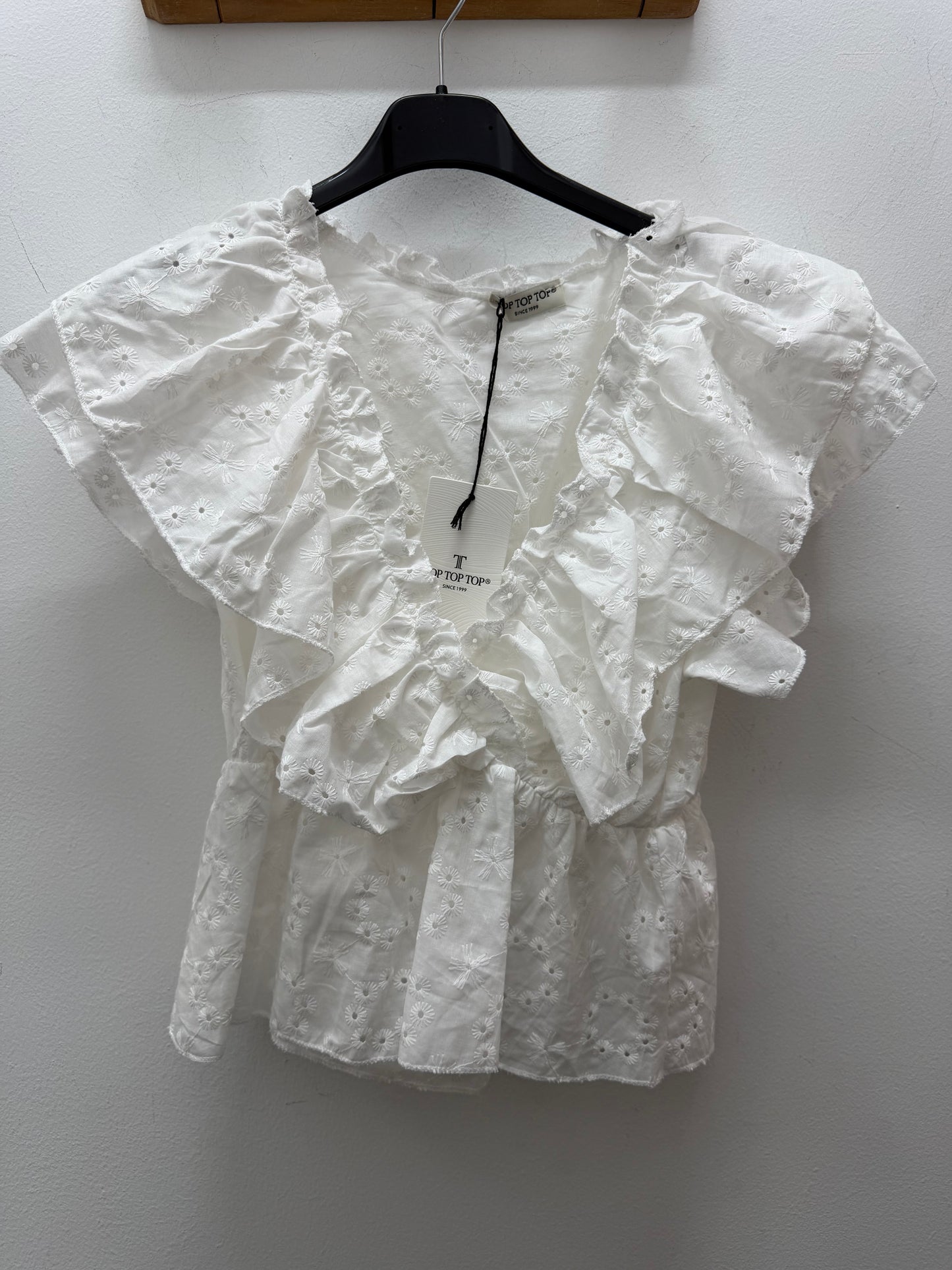 Blusa perforada