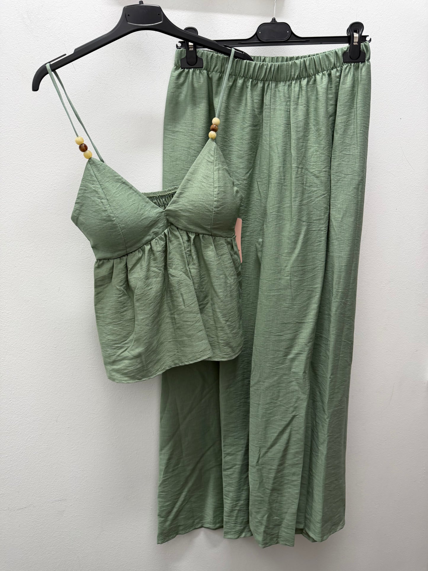 Conjunto verde tiranta