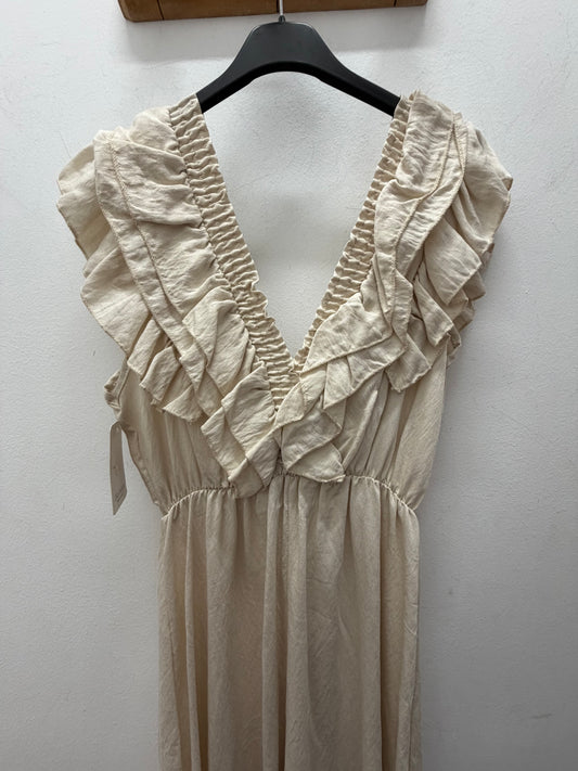 Vestido beige volantes