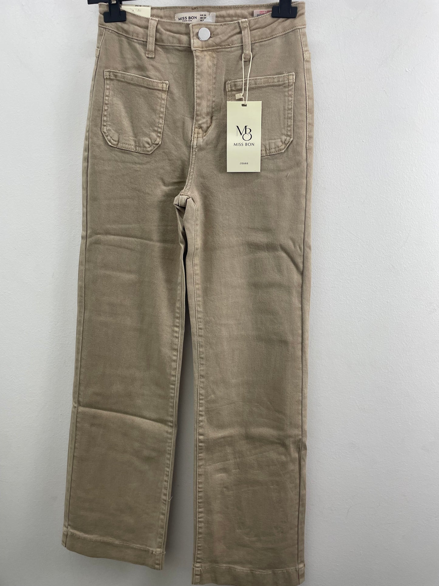 Vaquero beige bolsillos